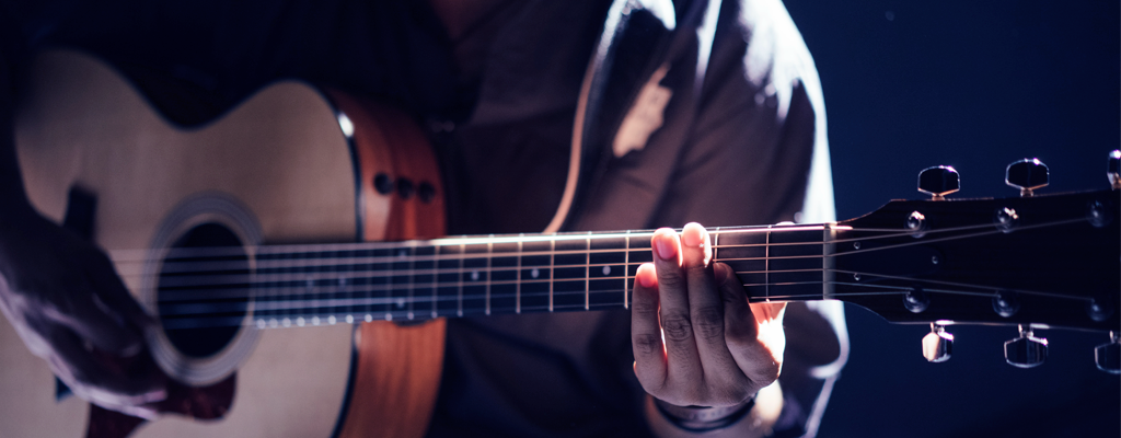 aprender a tocar la guitarra clases escuela musica